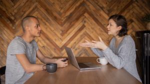 A small business owner meeting with a consultant