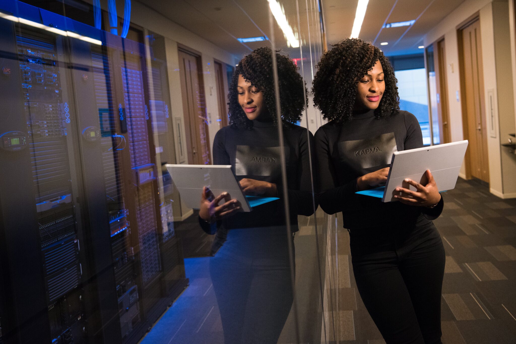 Woman Updating Cybersecurity for her Small Business